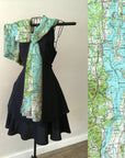 Topographical Lake Champlain map scarf draped on mannequin