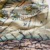 Close-up of a vintage map with text and geographical details.