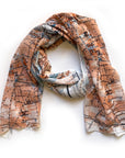 Map-themed scarf on a white background