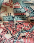 Vintage map of a harbor with labeled docks and streets