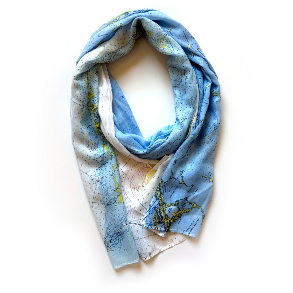 Blue and white scarf with star pattern on a white background