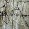 Map detail showing 'Little Compton' on a textured surface