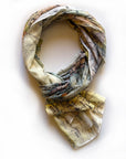 Map patterned scarf on a white background
