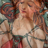 Artistic depiction of a woman's chest with decorative chainmaille design.