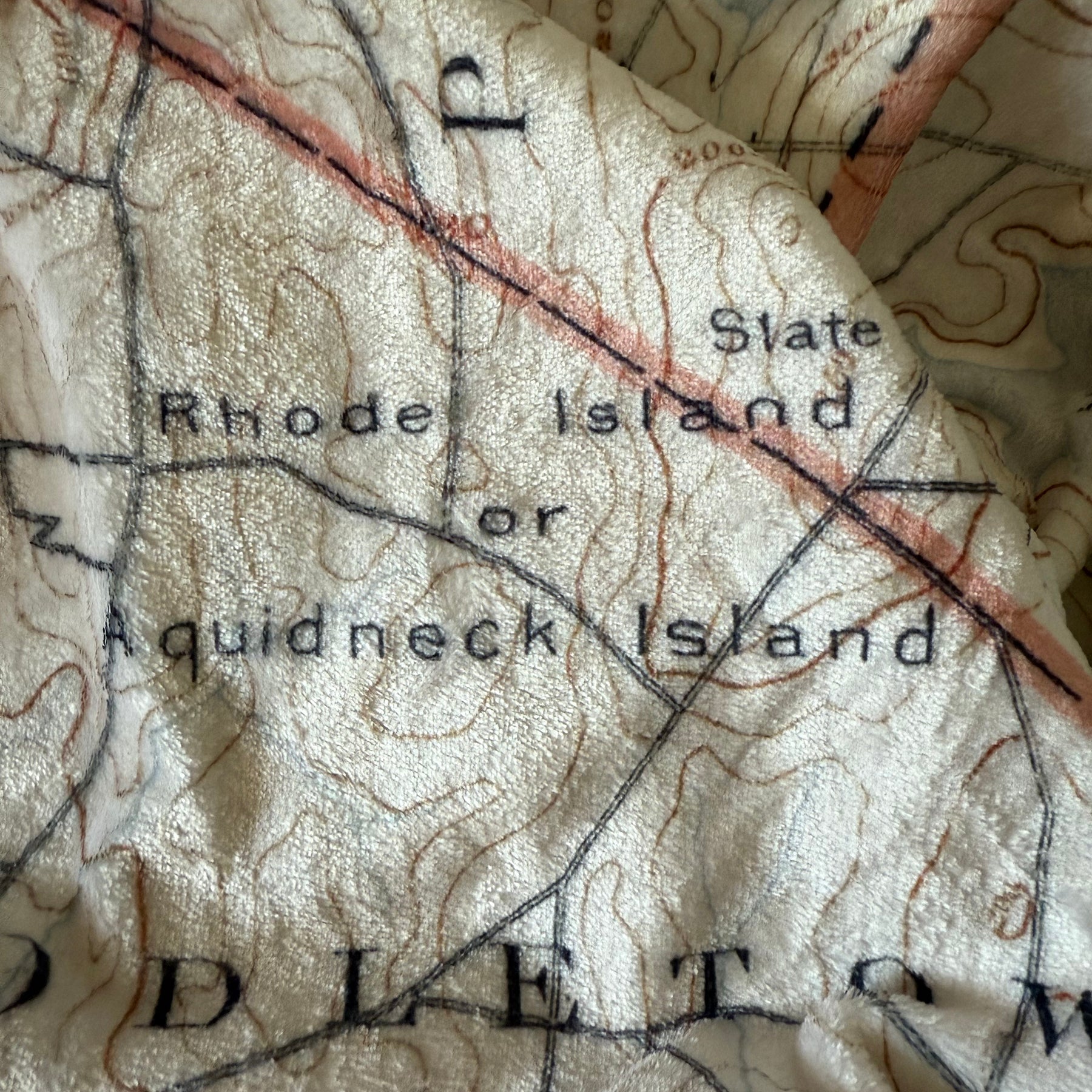 Close-up of an old map with text and topographic lines