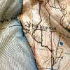 Topographic map with 'Richmond' labeled on a textured fabric background