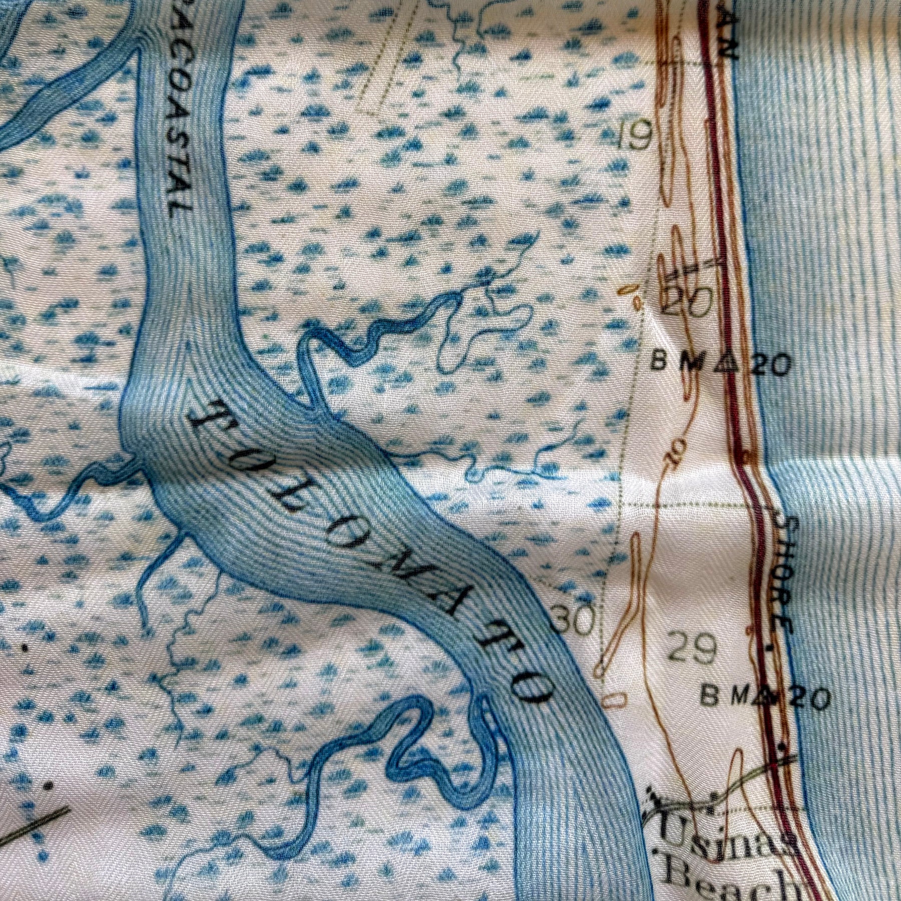 Map detail showing a river labeled 'Polomato' with topographic features.